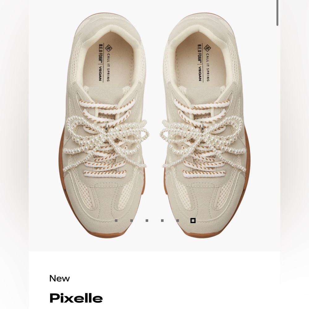 Cream low top sneakers